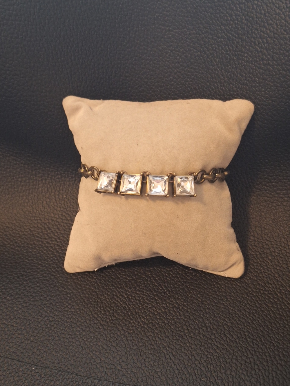 Gold-Tone Bracelet with Four Clear Square Stones Stamped